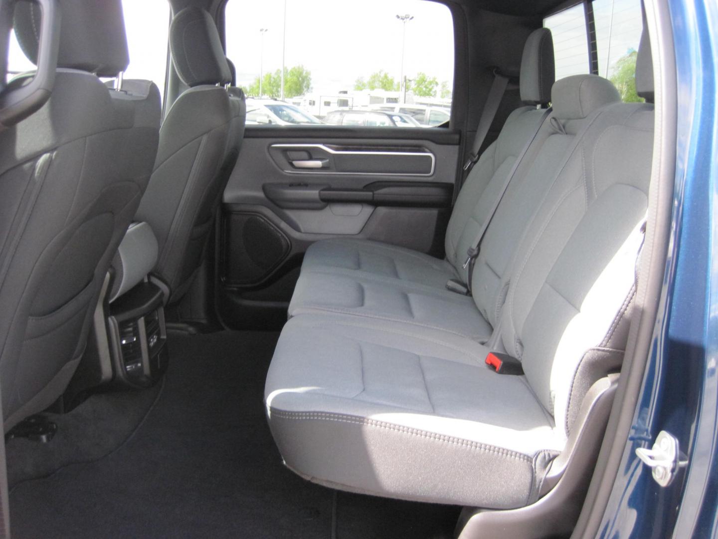 2023 blue /gray RAM 1500 Big Horn Crew Cab 4WD (1C6SRFMTXPN) with an 5.7L V8 OHV 16V engine, 8A transmission, located at 9530 Old Seward Highway, Anchorage, AK, 99515, (907) 349-3343, 61.134140, -149.865570 - Photo#5